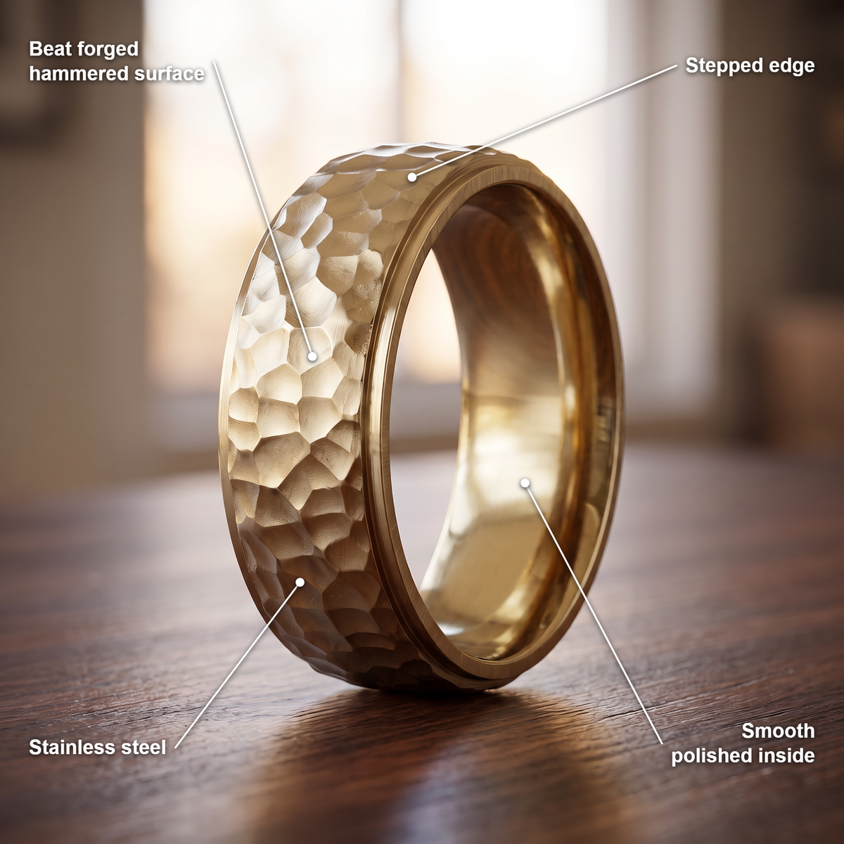 The Crater ring details in gold: beat forged hammered surface, stepped edge, stainless steel, smooth polished inside