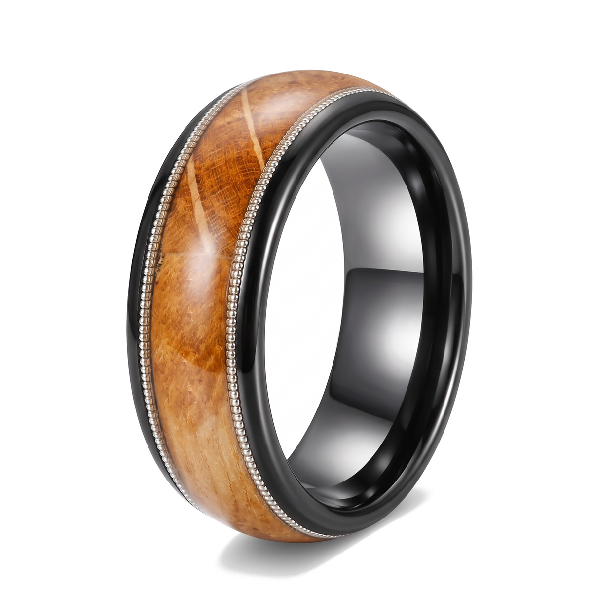 The Encore black polished tungsten ring with whiskey barrel wood and guitar string inlay on a white background