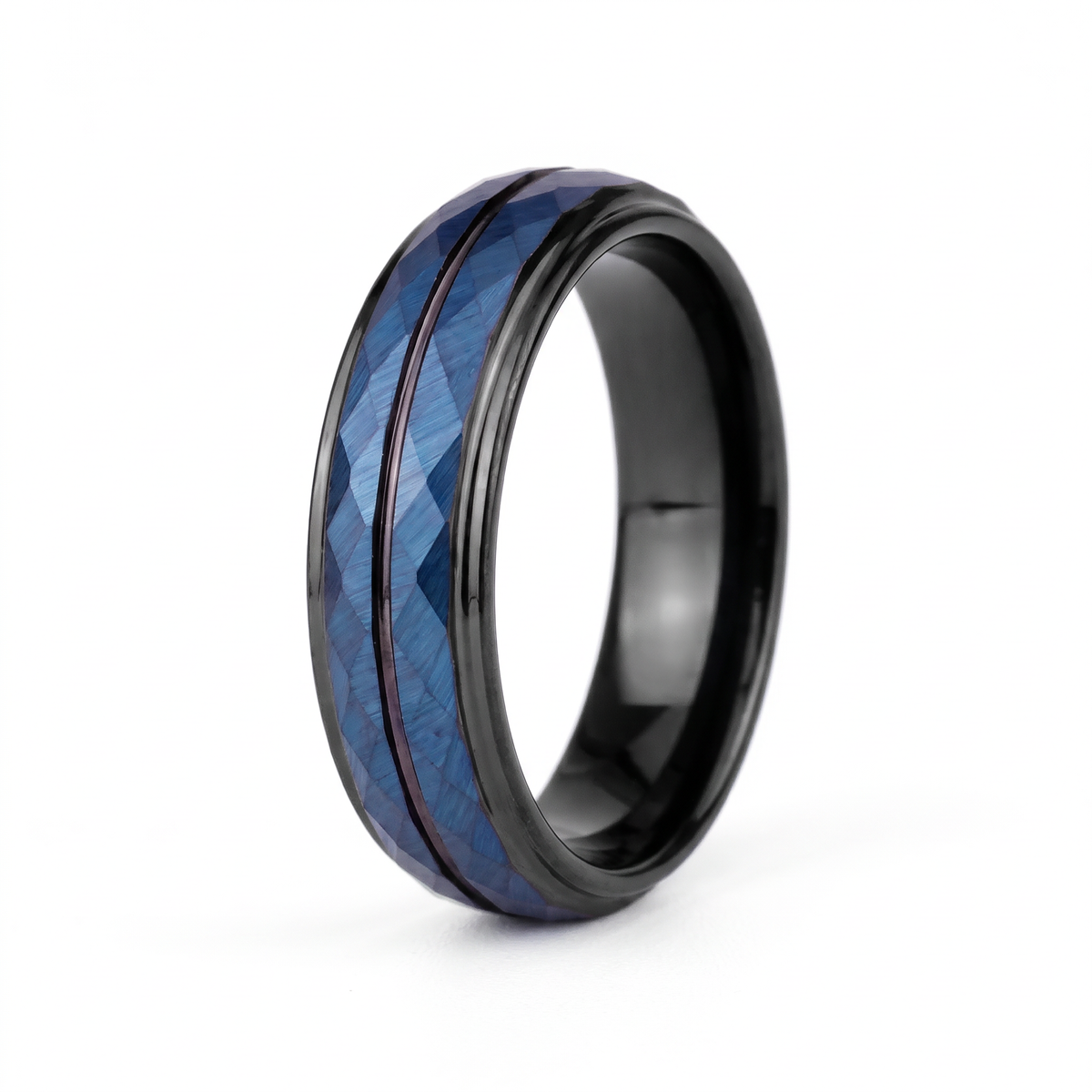 The Lattice black tungsten ring with a blue rhombus cut face, on a white background