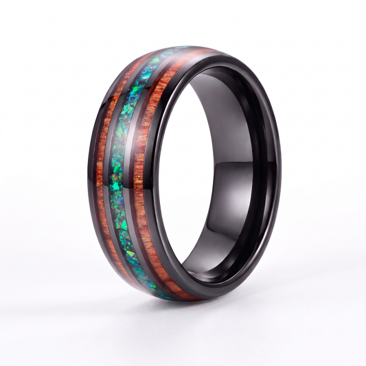 The Canopy black polished tungsten ring with green opal and koa wood inlays on a white background