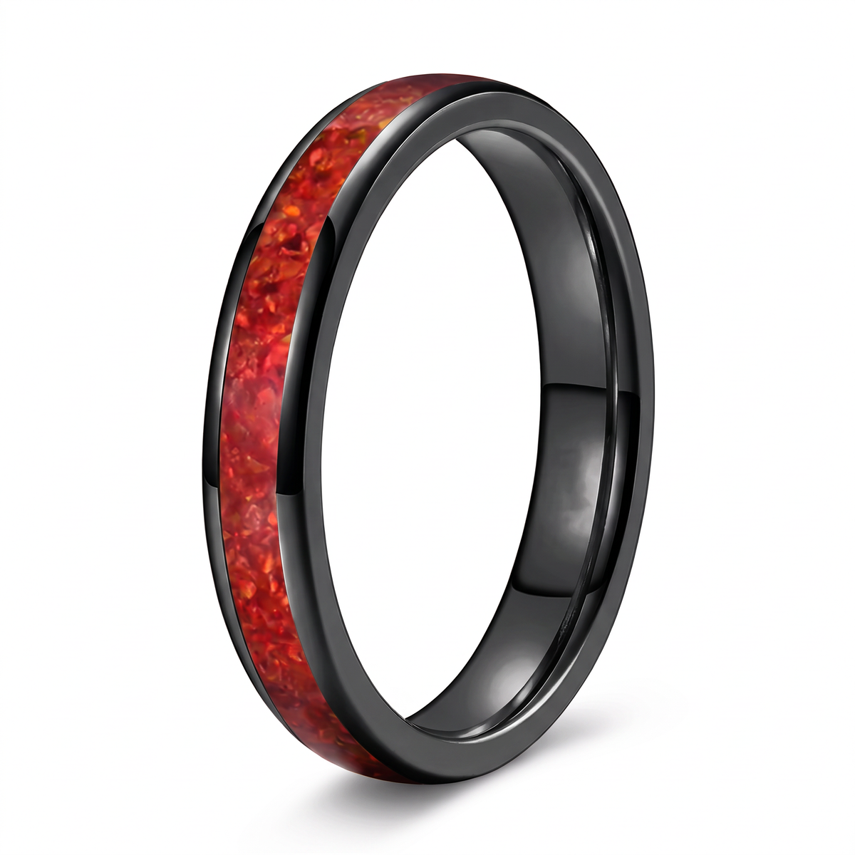 The Cinder black tungsten ring with a red opal inlay, on a white background