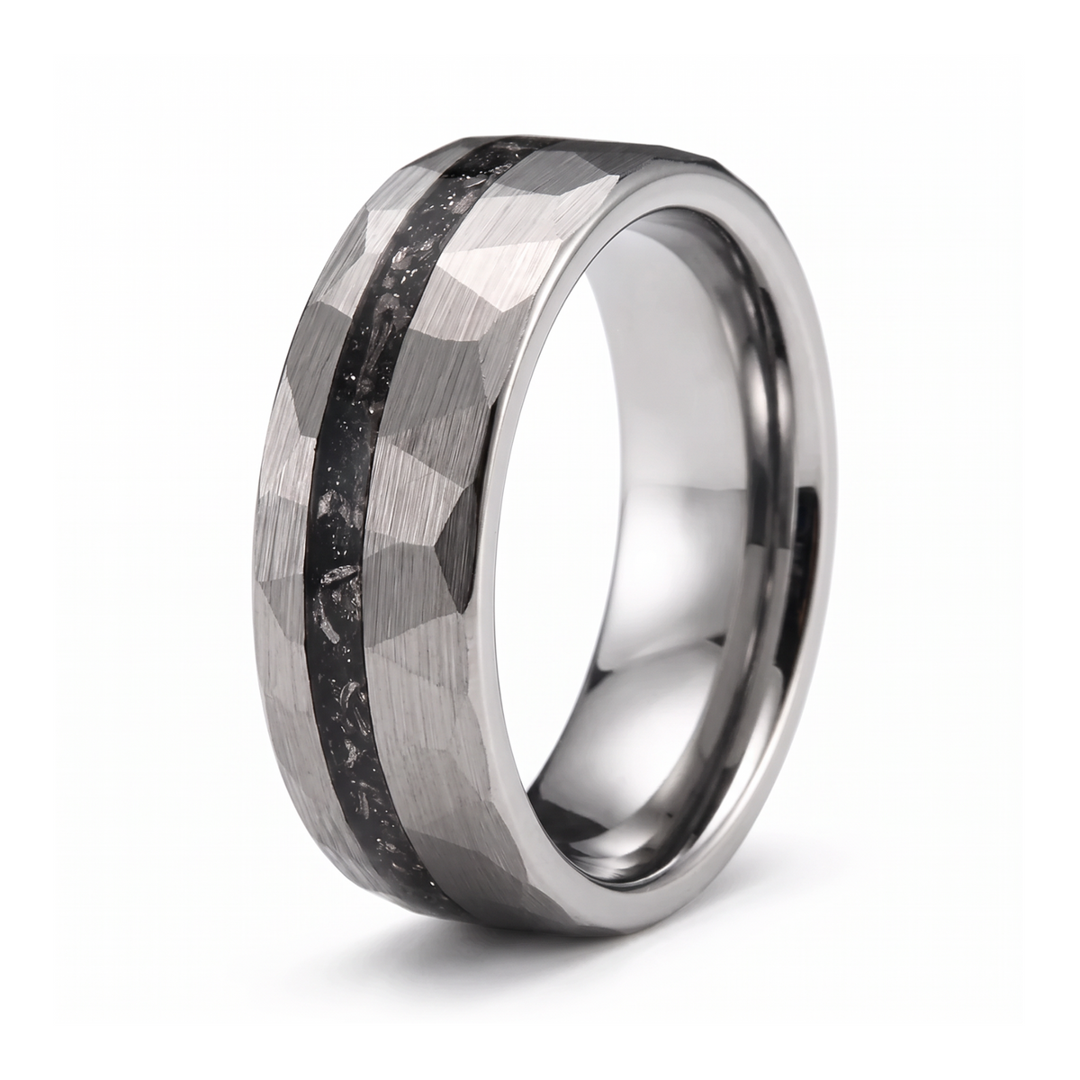 The Meteor hammered gray tungsten ring with a black meteorite fragment inlay on a white background