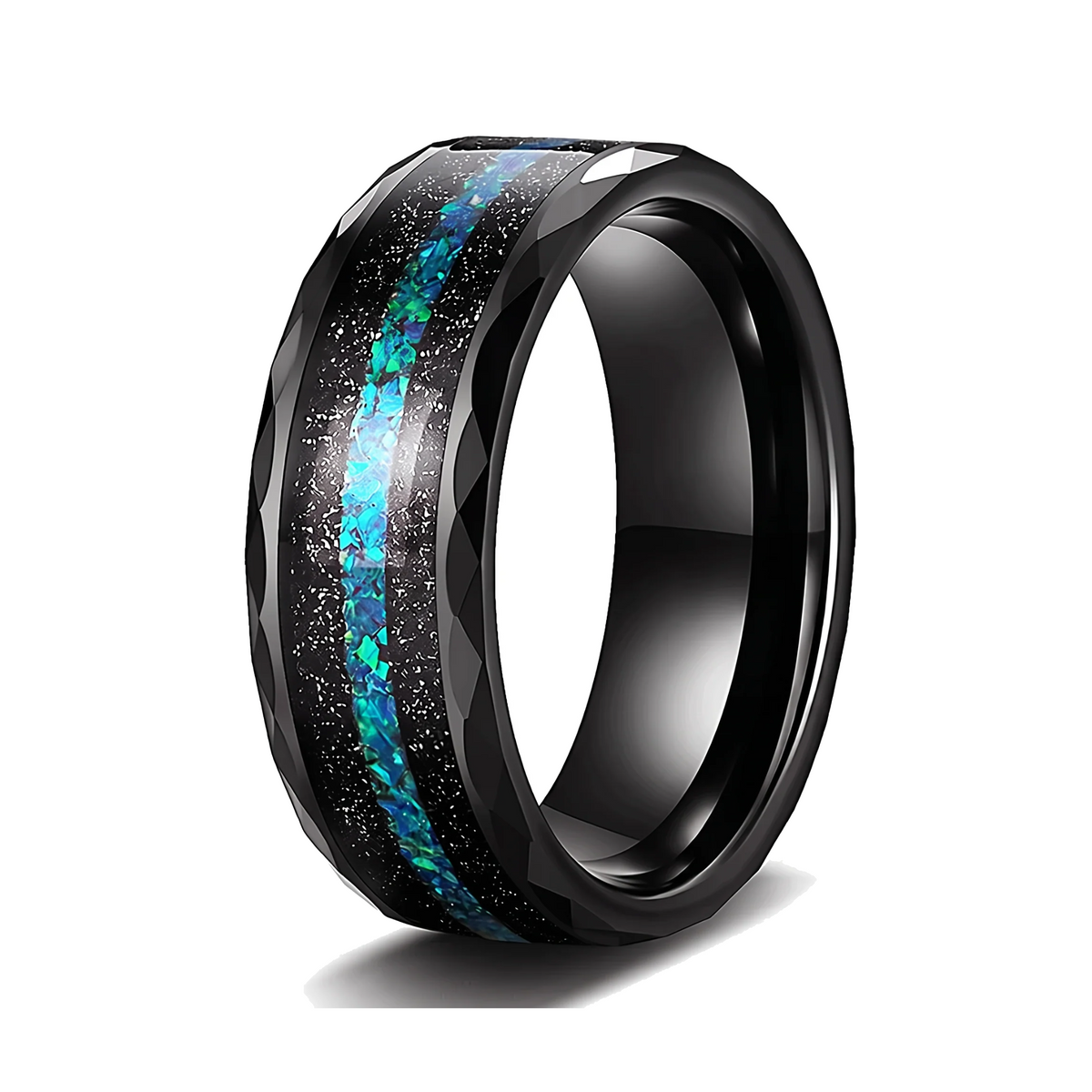 The Reef black tungsten ring with black sand and green blue opal inlay on a white background