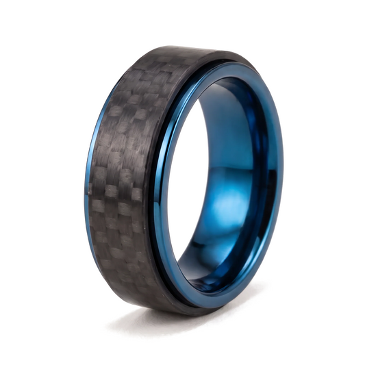 The Spinner ring with a rotating carbon fiber outer band and a polished blue stainless steel core on a white background