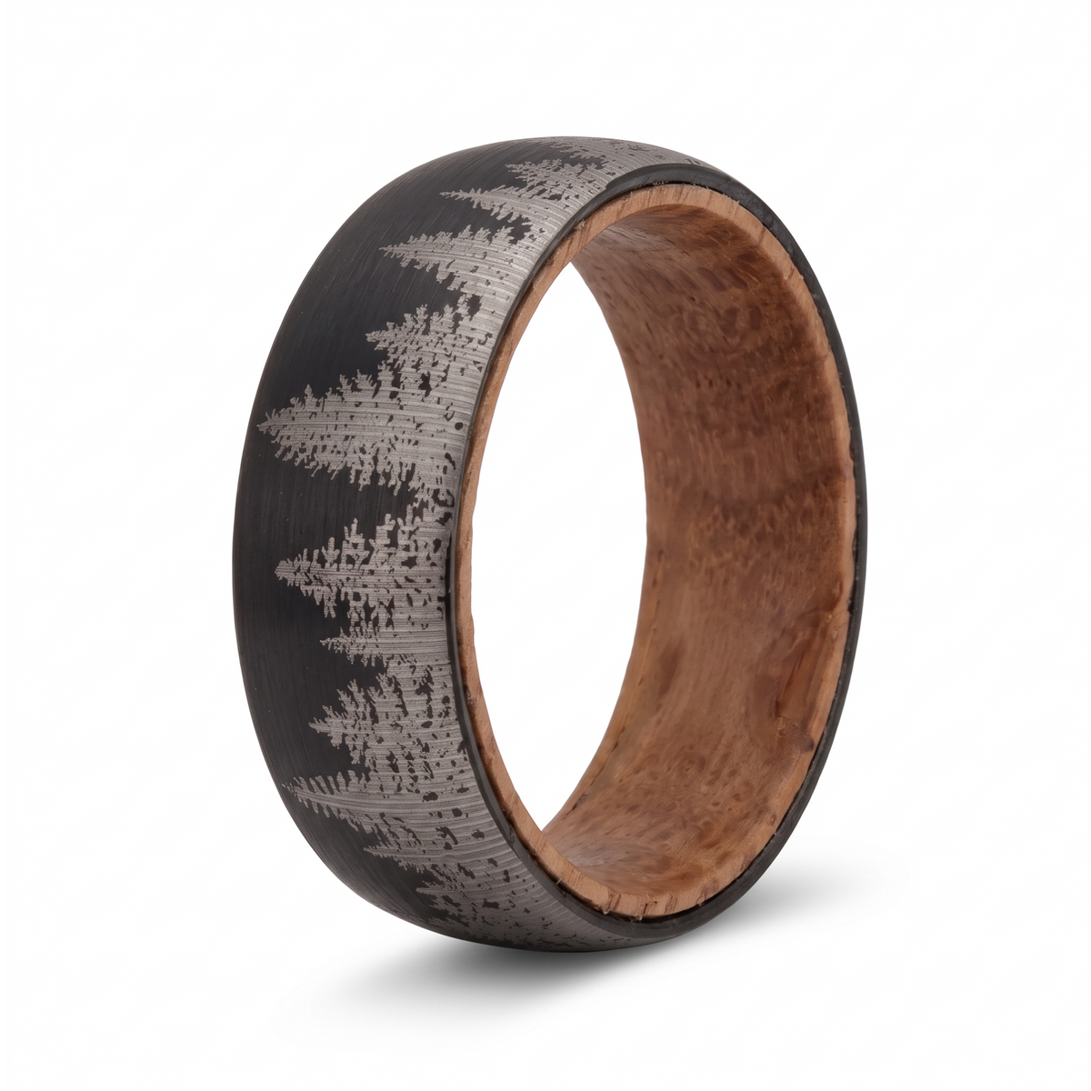 The Timberline brushed black tungsten ring with laser etched forest pattern and wine barrel wood interior